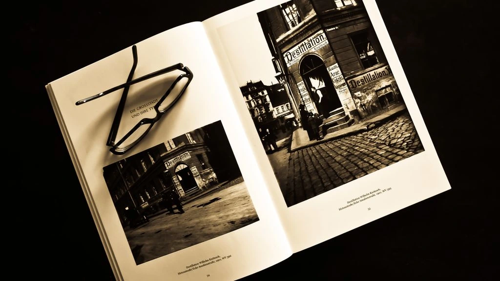 Editorial photograph of an open gaming publication on a dark desk